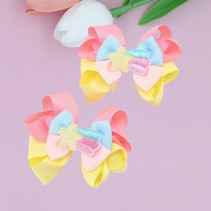 Set of colorful grosgrain ribbon hair bows with embroidered stars and rainbow details