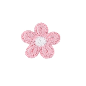Close-up of pink and white crochet flower hair clip with detailed hand-stitched textures