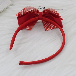 Cerchietto rosso a coste alla moda con un grande fiocco a righe da 12 cm per bambine