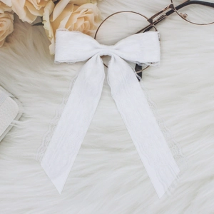 Elegante fermaglio per capelli con fiocco in pizzo bianco francese e lunghi nastri chic