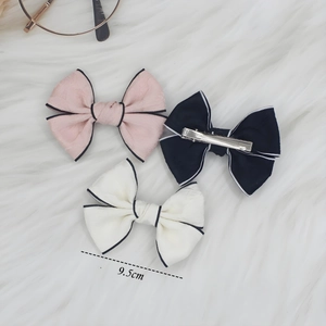 Lot de 3 barrettes nœuds en jacquard rose blanc et noir de 9,5cm avec pince en métal