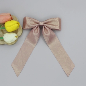 Barrette à nœud papillon long en tissu métallisé or rose pour coiffures de mariage