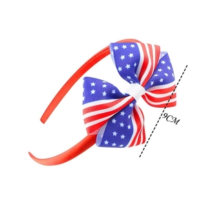Independence Day headband featuring 9cm US flag pattern bow with red white stripes and stars