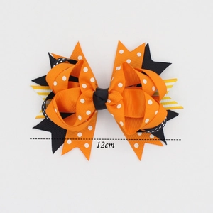 Nœud à cheveux Halloween de 12cm avec pois orange et rubans à rayures noires et jaunes