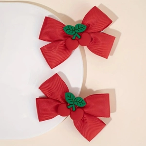 Sweet red bow hair clips with cherry resin accents for girls and kids 2-piece set