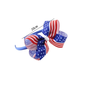 Detail showing the 10cm US Independence Day grosgrain ribbon bow with stars and stripes