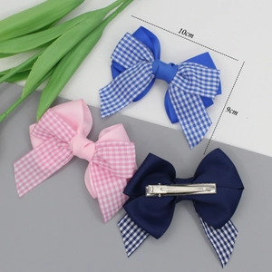 Trois barrettes à nœuds à carreaux roses et bleus avec pinces crocodiles en métal