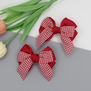 Paire de barrettes à cheveux à nœuds à carreaux rouges et blancs pour petites filles