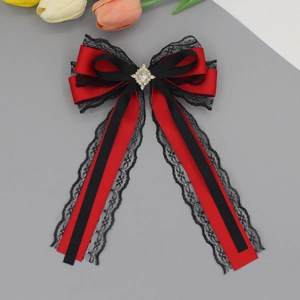 Elegant red and black lace bow hair clip with rhinestone center in Lolita style