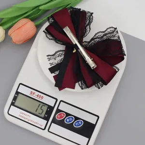 Elegant wine red satin and black lace bow hair clip for women weighing 15 grams