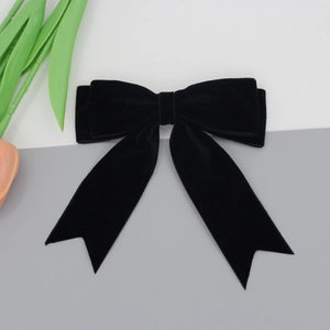 Elegant black velvet swallowtail bow hair clip for women with long vintage ribbons