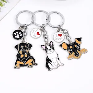 Tre portachiavi in metallo con diverse razze canine e ciondoli I Love Dogs e Rottweiler