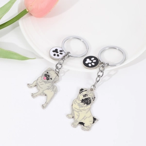 Creative metal pug dog keychain with paw charm and enamel finish for bag decoration