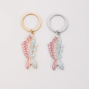 Tropical fish enamel keychain set in gradient pink and blue with sparkly rhinestone accents