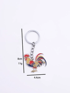 Detailed view of rooster keychain with 8cm length and colorful enamel finish