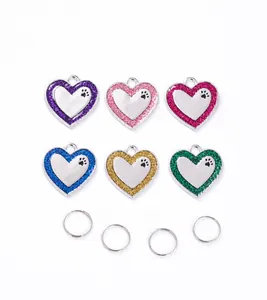 Macro shot of glittery heart-shaped pet ID tags in six vibrant colors with metal rings