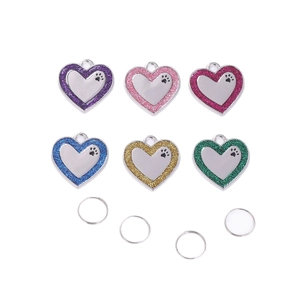 Set of six colorful heart-shaped metal pet ID tags with paw print and glitter borders