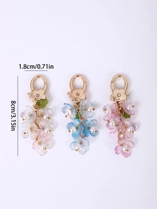 Detailed dimensions of floral bag charms with translucent petals and faux pearls
