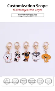 Detailed view of various cartoon dog charms with golden heart-shaped lobster clasps