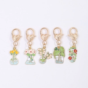 Set di portachiavi floreali in metallo con chiusura a cuore e motivi botanici di tulipani