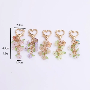 Floral heart lobster clasp keychains with butterfly charms in five assorted colors