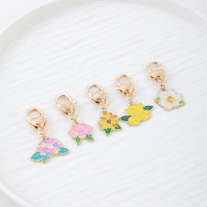 Set of 5 enamel floral charms with heart lobster clasps featuring hydrangea and sunflower
