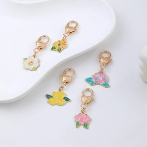 Set of 5 enamel floral charms with heart lobster clasps featuring assorted colorful flowers