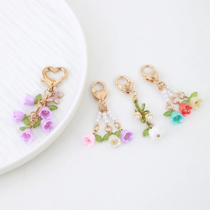 Colorful lily of the valley keychains with heart-shaped lobster clasps in various styles