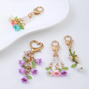 Floral lily of the valley keychains with colorful charms and heart shaped metal hooks