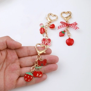 Porte-clés cœur fraise cerise rouge avec pendentif nœud et fermoir homard doré