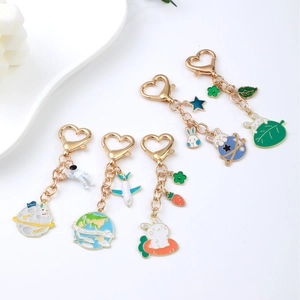 Space rabbit and astronaut enamel keychains with golden heart clips for bags