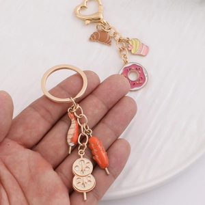 Creative metal keychain featuring cartoon dessert and barbecue food pendant charms