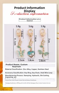 Detail showing dimensions and materials of dragonfly and heart pendant keychains