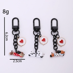 Lot de trois porte-clés teckel en émail double face avec mousquetons et pendentifs cœur