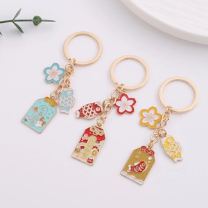 Japanese sakura cherry blossom keychain set with lucky koi and blessing charms