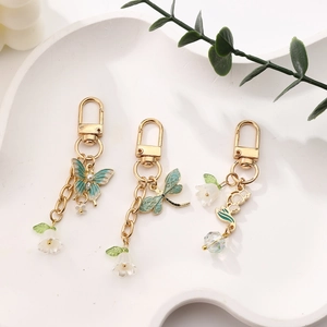 Eleganter Maiglöckchen Metall Schlüsselanhänger Schmetterling Libelle Blume Anhänger Vergoldet Schlüsselring Für Taschenschmuck Damen Geschenk