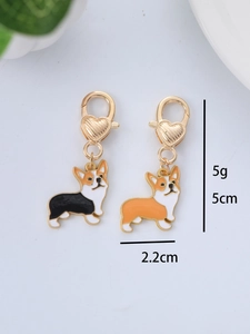 Detail view of enamel Corgi metal pendants with heart lobster clasp and 5cm size scale
