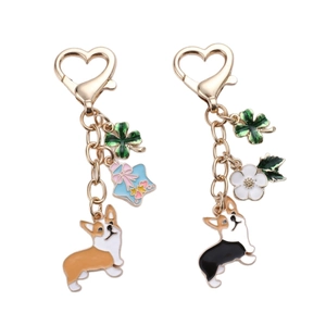 Golden alloy Corgi dog keychain set with heart clasp, four-leaf clover and star charms