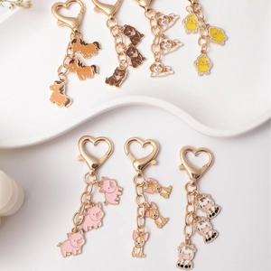 Cute cartoon animal enamel keychains with heart hooks for bags and keys