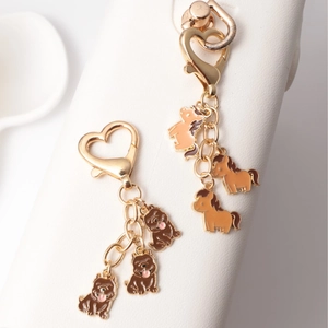 Cute enamel dog and pony keychain charms with heart-shaped lobster clasps in gold