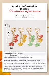 Detail view of colorful maple leaf keychains with size 8x2cm and zinc alloy material
