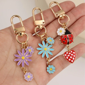 Daisy and ladybug keychain set with gold lobster clasp for bags and keys accessories
