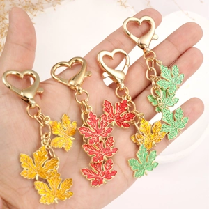 Colorful maple leaf keychain pendant with gold heart clasp for bags and gift accessories