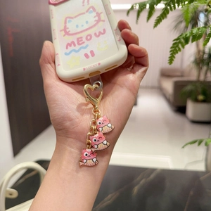 Cute cream phone case with pink cartoon cat fish pendant and lucky cat illustration