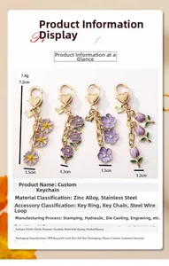 Detail of purple floral charms including tulip and rose styles on gold-tone metal chains