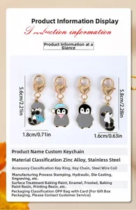 Tabella dettagliata delle taglie con portachiavi in metallo smaltato a forma di pinguino