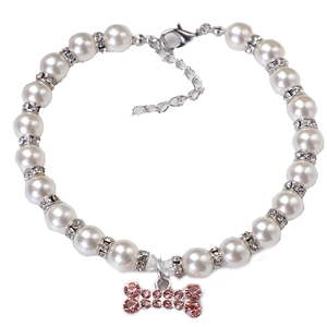 Elegant pearl pet collar featuring a pink rhinestone bone charm and adjustable chain