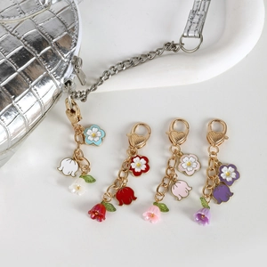 Lot de porte-clés muguet avec crochets en forme de cœur en quatre couleurs variées