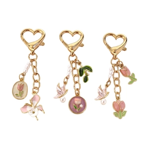 Lot de 3 porte-clés en métal doré avec tulipes roses, cœurs et perles élégantes