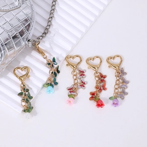 Fashion butterfly and tulip heart keychain set in five colors on white background
